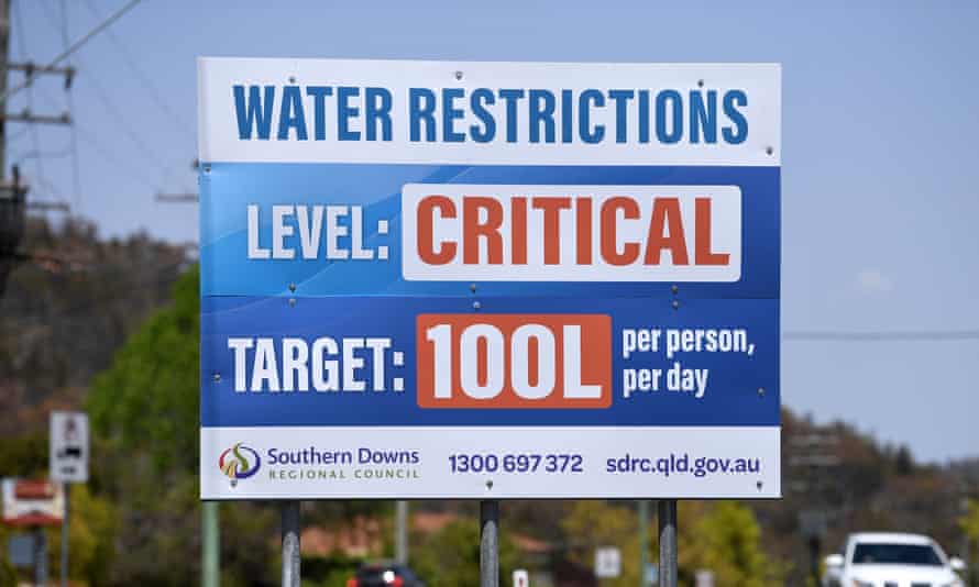A billboard in Stanthorpe, Queensland. Since the photo was taken, residents have been further restricted to 80L a day.