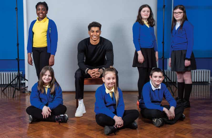 Marcus Rashford with pupils at his former primary school