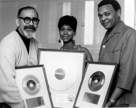 Producer Jerry Wexler, Aretha Franklin and her husband and manager Ted White celebrate a milestone in sales, circa 1968.