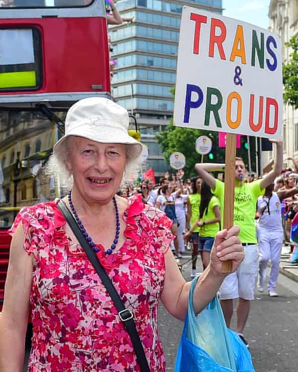 Transgender pensioner Margaret Pepper, 73, holds a placard