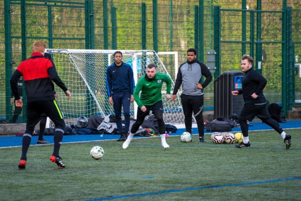 Premier League player Dave Kitson controls the ball during a Grenfell Athletic training session in London.