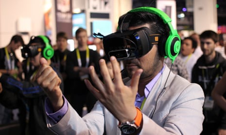 Razer OSVR open source virtual reality for gaming at CES 2015. The adoption of VR will depend on compelling games and content, experts say