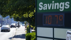 A display at an Olympia Federal Savings branch shows a temperature of 107 degrees Fahrenheit in Olympia, Washington.