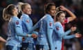 Manchester City celebrate a goal during their WSL victory over Bristol City.