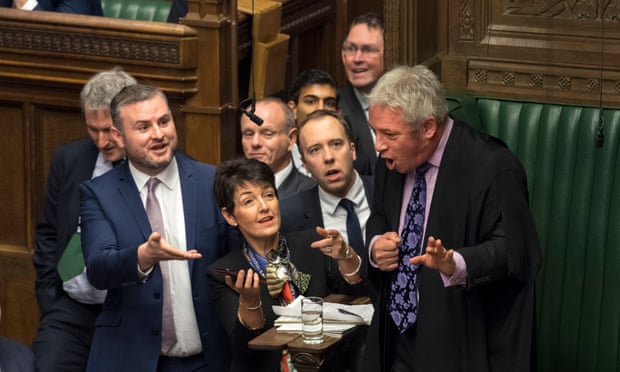 Tory MP Matt Hancock (centre) urges Commons Speaker John Bercow to look at a video clip of Jeremy Corbyn on a mobile phone, December 2018.