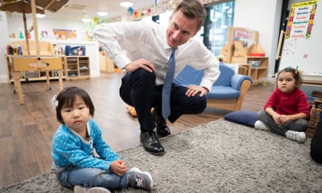 Jeremy Hunt at Busy Bees nursery, south London, after delivering his budget on 15 March.