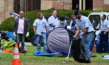 Workers clean up UCLA campus after police raid