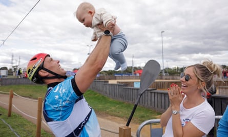 Joe Clarke of Great Britain celebrates with his son Hugo and wife Belle after winning gold in the men’s kayak final during day five of the ICF Canoe Slalom World Championships 2023 at the Lee Valley White Water Centre.