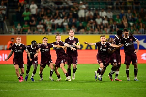 Heart of Midlothian players celebrate after the penalty shootout.
