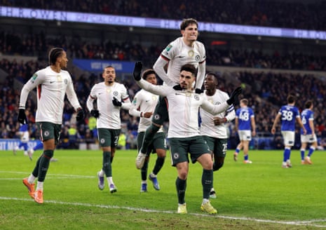Chelsea's Pedro Neto celebrates scoring at Cardiff City with Alejandro Garnacho