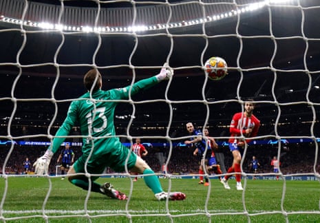 Inter Milan's Federico Dimarco scores their first goal past Atletico Madrid's Jan Oblak in their Champions League last 16 game at Atletico Madrid.