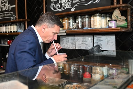 Smoothie moves … opposition leader Angus Taylor during a visit to cafe in Canberra on Monday morning.