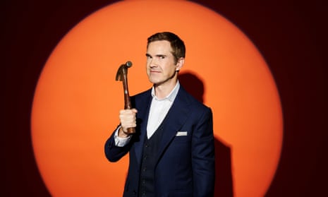 Jimmy Carr with a hammer