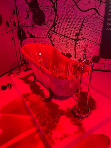A bloody bathtub in a museum exhibit