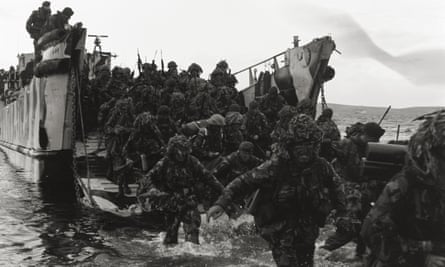 John Shirley’s photograph of 42 Commando Royal Marines storming ashore from a landing craft at Port San Carlos on the first day of the British land campaign