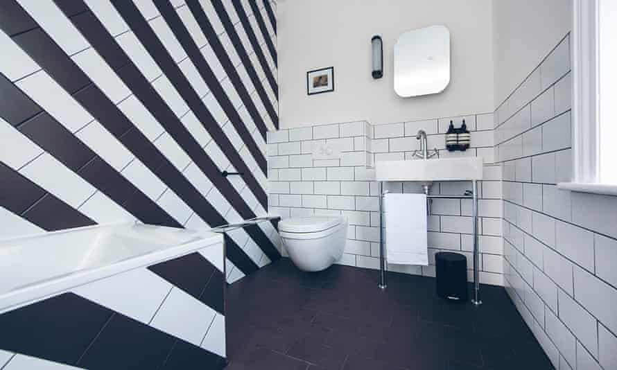 Bathrooms all have strident black-and-white tiling