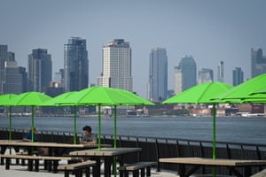 Seating area by the east river with Brooklyn in the background