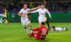 Son celebrates with Harry Kane.