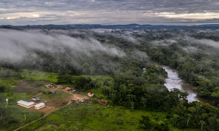 A mist covers the Aldeia Jamari in the Uru-Eu-Wau-Wau indigenous land on 16 December 2019.