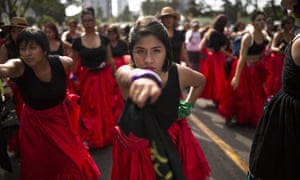 Women perform the Chilean protest song about rape culture, “A rapist in your path”, during a protest march marking International Women’s Day, in Lima, Peru. Saturday, March 7, 2020.