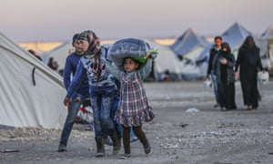 Syrian refugees in a camp on the Turkey-Syria border near Aleppo.