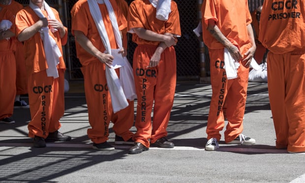 Inmates stand outside at San Quentin state prison in San Quentin, California, on 16 August.
