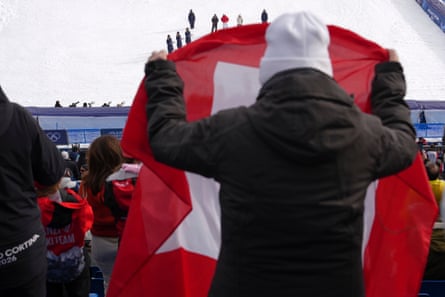 A Swiss flag in the crowd during the medal ceremony.