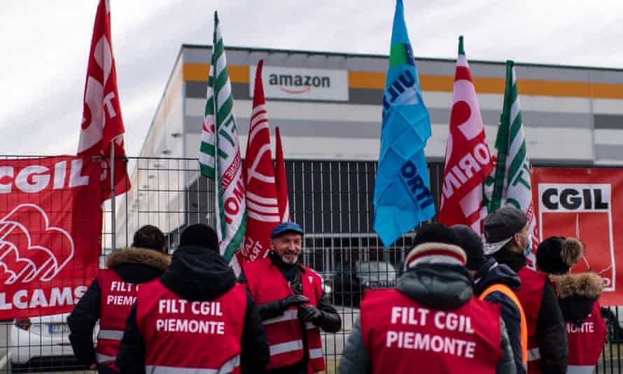 Amazon employees demonstrate in front of the company’s premises in Brandizzo, near Turin.