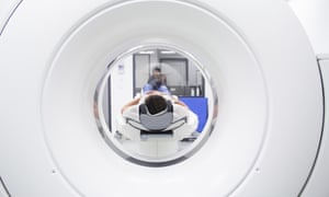 A patient is moved into an MRI machine