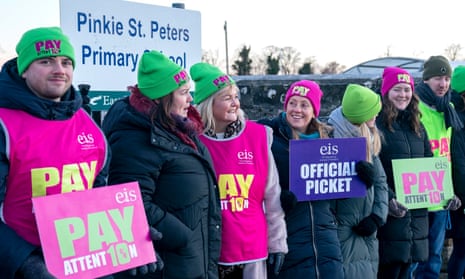 Teachers from the EIS union on the picket line outside Pinkie St Peters Primary School in Musselburgh, East Lothian, Scotland earlier today.
