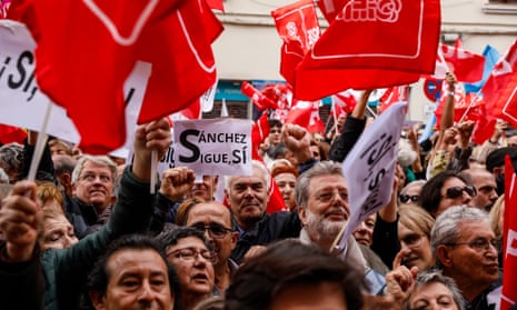 A man holds a placard reading 'Sanchez, keep it up!' amid other supporters gathering at a demonstration organized by the Spanish Socialist Workers' Party (PSOE) in support of Prime Minister Pedro Sanchez on April 27, 2024 in Madrid.