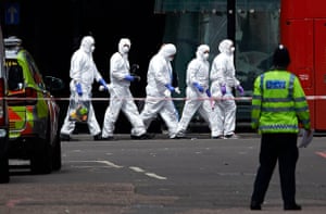 Police forensic officers work near Borough Market