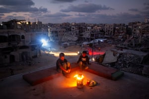 Two children on a rooftop in Khan Younis, Gaza, in September 2024