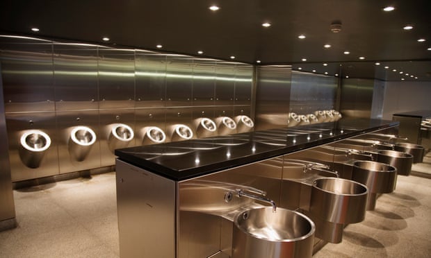 Stainless steel men’s public toilet,<br>London, UK.