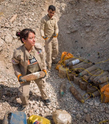 ‘We are strong and we cannot be defeated’: Hana Khider, with an unexploded ordnance found near Sinjar.