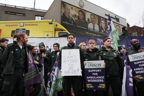 Ambulance workers on strike today outside the London ambulance service station in Waterloo.