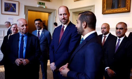 The Prince of Wales and Theyazin bin Haitham, heir to the Omani throne, listen to British explorer Mark Evans, left, at the Royal Geographical Society, London last month.