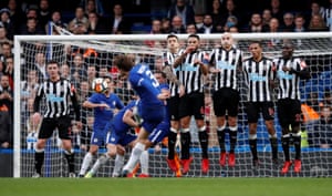 Alonso curls in the free-kick.