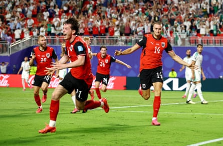 Austria’s Sasa Kalajdzic celebrates his crucial late equaliser against Algeria