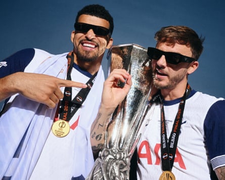 Dominic Solanke and James Maddison, posing in May with the Europa League trophy