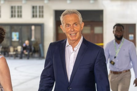 Tony Blair with suntan in a suit