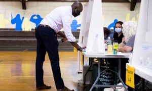 Voter Brian Taylor prepares to cast his ballot in the Democratic primary in Philadelphia, Pennsylvania Tuesday.