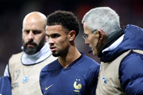 Warren Zaire-Emery is helped from the pitch after being injured during his side’s record-breaking 14-0 win over Gibraltar. The teenager had a mixed debut, scoring before being forced off in the 16th minute.
