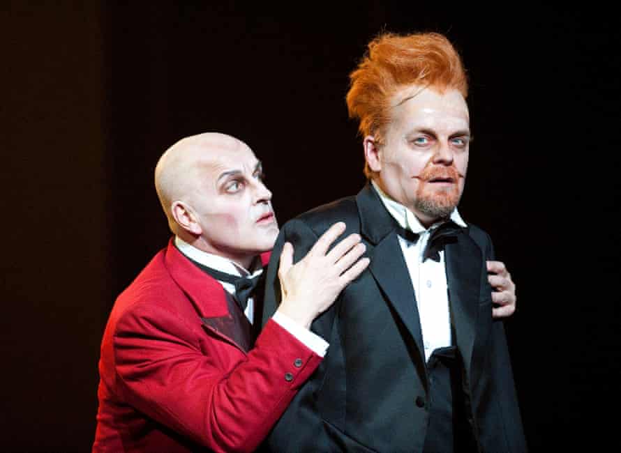 Christopher Purves as Mephistopheles and Peter Hoare as Faust in Terry Gilliam's The Damnation of Faust, for the English National Opera.
