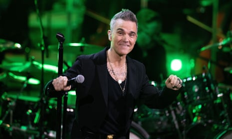 Robbie Williams defends decision to perform in Qatar during World Cup ...