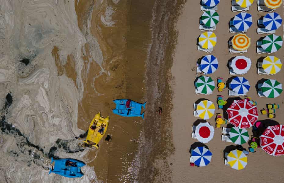 Pedalos on the banks of the Marmara Sea covered with sea snot, a jelly-like layer of slime, in Kocaeli, Turkey