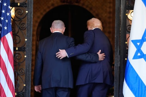 Israel's prime minister, Benjamin Netanyahu, and US president Donald Trump walk into Trump's Mar-a-Lago club in Palm Beach, Florida, in December 2025.
