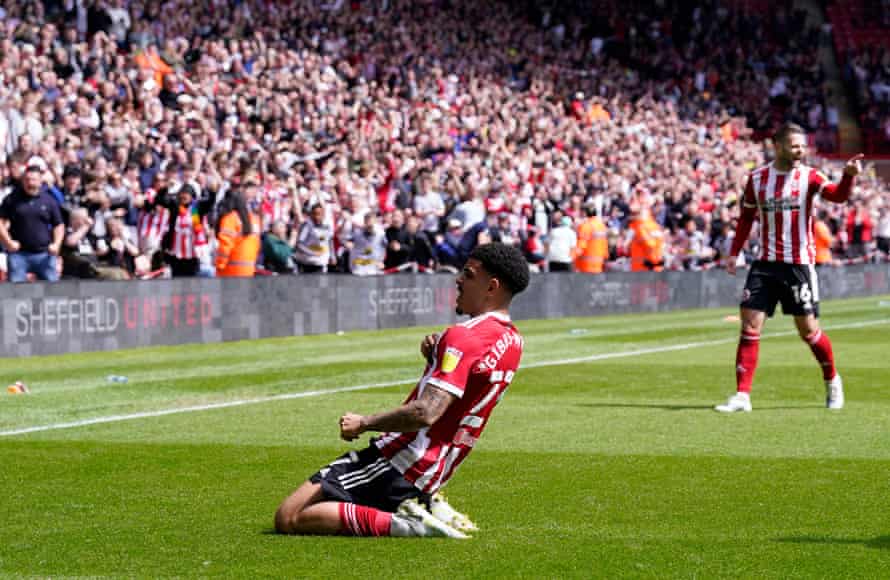 Gibbs-White celebrates scoring.
