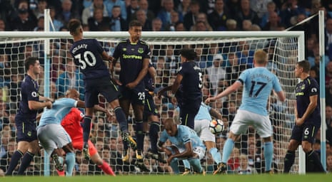 The Everton wall defends a free kick taken by Kevin De Bruyne of Manchester City