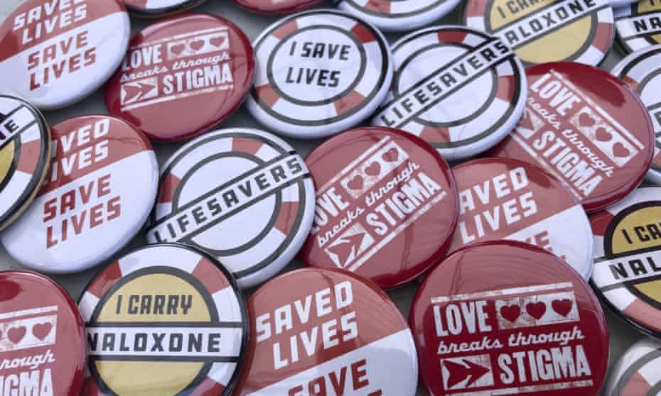Buttons are displayed at a tent during a health event in Charleston, West Virginia on 26 June 2021. 